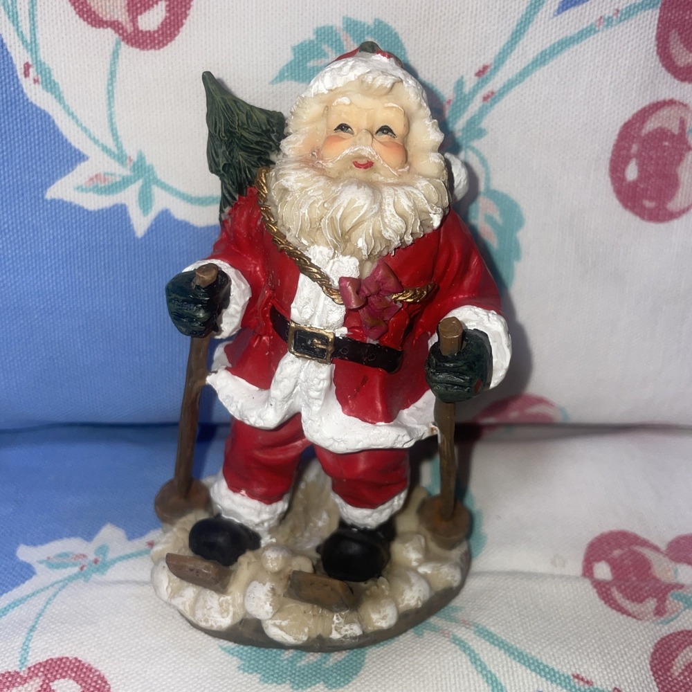 Vintage Santa Figurine Skiing Carrying a Christmas Tree on his Back